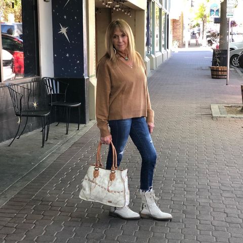 No better sweater than one made from cashmere! New arrivals, sustainably made, hand washable! Paired with vintage white boots & bag, and statement necklace!