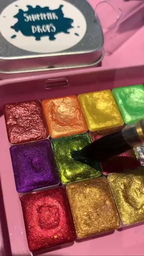 Wrapping our handmade shimmer watercolor paint. This is one of the lim